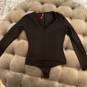 Never worn Spanx suit yourself long sleeve v neck bodysuit